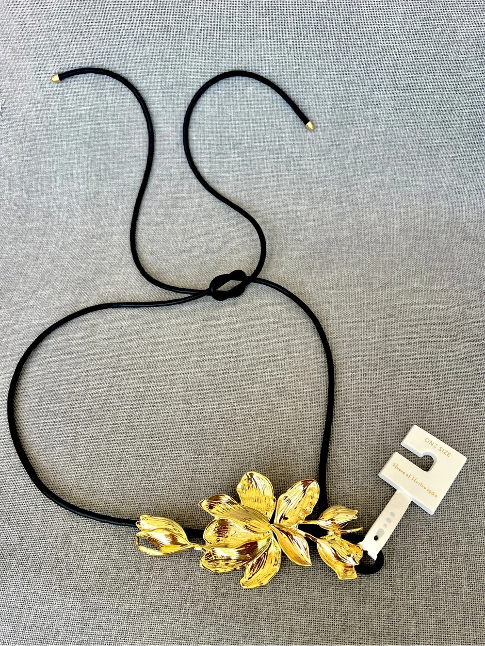 House of Harlow 1960 Gold metal flowers black vegan leather rope